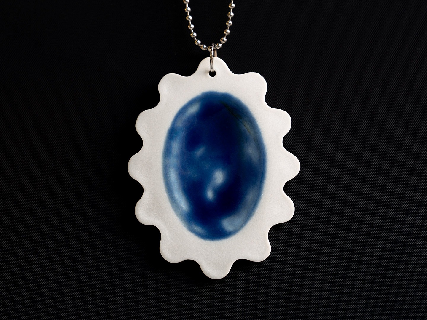 Porseleinen hanger blauw